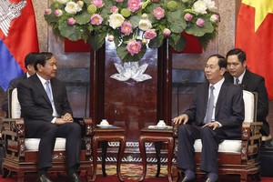 國家主席陳大光接見柬埔寨高級部長、外交與國際合作部部長布拉索昆。（圖源：VNA）