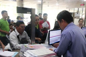 第十二郡試行無午休辦事制度。圖為該郡卷宗受理與退還部門。（圖源：玉霞）