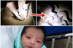 警察小心地把女嬰從泥土中掘出。（圖源：互聯網）