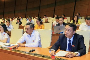 國會昨(12)日上午以86.86%贊成票表決通過《網絡安全法》。（圖源：越南快訊）