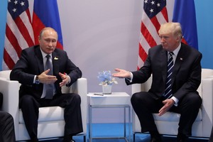 去年7月美總統特朗普與俄總統普京會晤。（圖源：路透社）