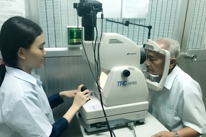 醫療服務費下調有助民眾減輕負擔。