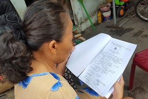 守德郡長壽坊某家長已收到入學通知書並到校辦理入學手續。