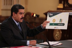 8月17日晚，委內瑞拉總統馬杜羅宣佈，石油幣今後將作為該國的國際記賬單位，一個石油幣將等於3600主權玻利瓦爾。（圖源：路透社）