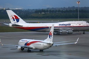 馬來西亞交通部：為配合本月31日舉行的國慶飛行表演，吉隆坡國際機場附近空域關閉，預計近500架次航班將會受到影響。（圖源：路透社）