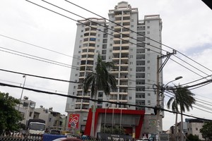 圖為新富郡富盛公寓，居民八年尚未拿到“粉紅簿”。（圖源：PV）