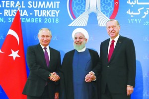 俄羅斯總統普京、伊朗總統魯哈尼和土耳其總統埃爾多安，在德黑蘭舉行敘利亞問題峰會。（圖源：互聯網）