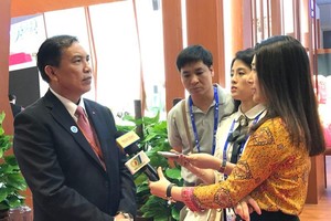 檳椥省人委會主席高文仲在中國-東盟博覽會上接受媒體採訪。