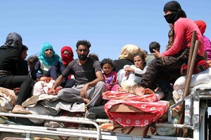 敘利亞難民返鄉。（圖源：Sputnik）