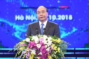 政府總理阮春福在招商引資30年總結會議上發表講話。（圖源：VGP）