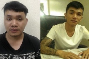 被抓獲的兩名嫌犯范友南(左)及黎功俊。（圖源：T.H）