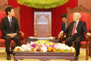 黨中央總書記、國家主席阮富仲接見日本首相特使。（圖源：越通社）