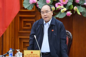 政府總理阮春福主持會議。（圖源：光孝）