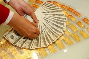 金價與美元匯率下降。（示意圖源：互聯網）