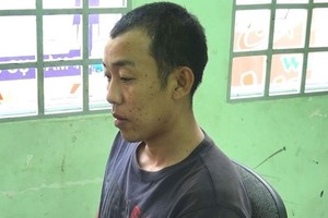 被扣押的殺人嫌犯阮友俊。（圖源：武匯）