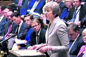 22日，特雷莎·梅向英國議會報告談判最新進展。  （圖源：AFP）