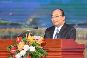 政府總理阮春福在2018年高平省投資、貿易與旅遊促進會議上致詞。（圖源：光孝）