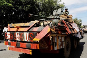 菲律賓國會參眾兩院12日召開聯席會議，以壓倒性多數的投票結果通過了菲總統杜特爾特關於延長南部地區戒嚴令至2019年年底的提議。（圖源：路透社）