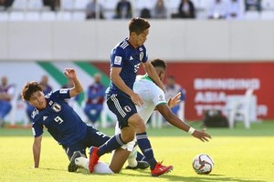 日本隊(藍衣) 1 比 0 擊敗沙特阿拉伯隊。（圖源：互聯網）