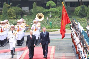 黨中央總書記、國家主席阮富仲主持歡迎阿根廷總統儀式。（圖源：仲海）