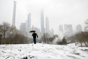 紐約也受暴雪影響。（圖源：AFP）