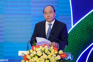 政府總理阮春福在發起儀式上，呼籲我國人民加強運動、步行、騎自行車、做體操等。（圖源：VGP）