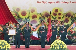 國防工會處舉行的一等捍衛祖國勳章迎接儀式。（圖源：賢芳）