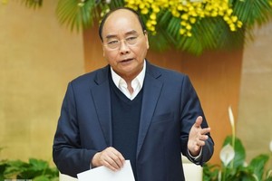 政府總理阮春福在會議上致詞。（圖源：光孝）