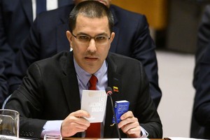 委內瑞拉外交部敦促特朗普為全人類的未來辭職。（圖源：AFP）