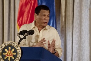 杜特爾特說，自治區成立將能促使南部重回和平穩定。（圖源：AFP）