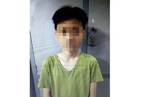 被扣押的涉案嫌犯T.A.P