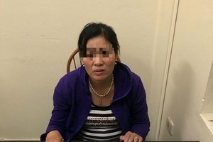 狠心澆油燒死母親的黎氏鸞。（圖源：人民公安報）