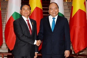 政府總理阮春福（右）與緬甸總統吳溫敏。（圖源：陳海）