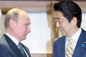 普京與安倍。（圖源：共同社）