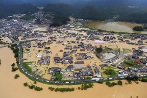 日本研發城市暴雨內澇災害預測系統。圖為去年7月中旬日本廣島縣三原市本鄉町暴雨引發水災現場。