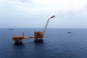 越南國家油氣集團(PVN)的24個海外油氣勘探項目正在辦理結束手續，共損失7億7300萬美元。（示意圖源：T.T）