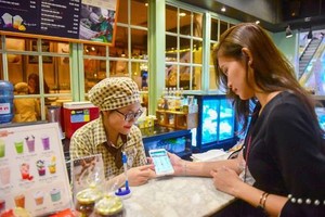 年輕人熱衷使用電子錢包。（圖源：友順）