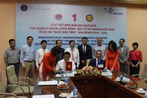 合作備忘錄簽訂儀式。（圖源：越通社）