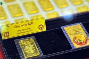 昨(22)日，本市各黃金企業標貼的SJC金片買入價每兩3860萬元，賣出價每兩3885萬元。（圖源：VOV）