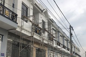 古芝縣平美鄉的“三同住房”區正在建設中。