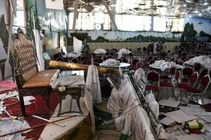 自殺式炸彈襲擊阿富汗喀布爾婚禮會場 63死180傷。（圖源：AFP）
