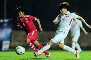 越南隊(白衣)-緬甸隊比賽一瞥。（圖源：互聯網）