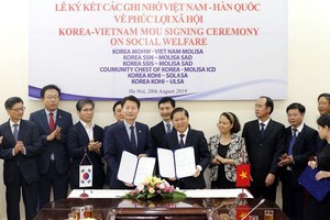 越韓勞動和就業領域合作備忘錄簽署儀式。（圖源：貴德）