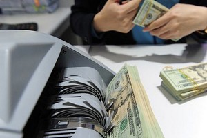 今年前8個月，通過本市各信用組織所得的僑匯收入達36億5000萬美元。（示意圖源：互聯網）