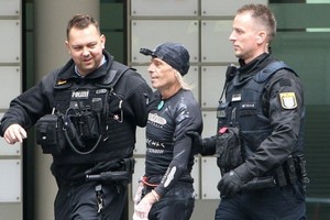 阿蘭‧羅伯特被拘留。（圖源：AFP）