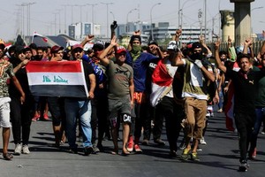 伊拉克示威抗議活動。（圖源：路透社）