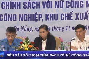 圖為峴港女工人政策座談會主持人席。（圖源：視頻截圖）
