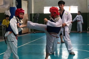 第五郡少兒參加跆拳道比賽。