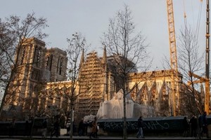 當前還處於重建過程中的巴黎聖母院。（圖源：AFP）