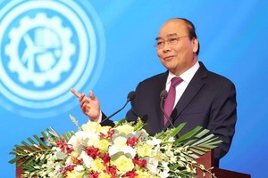 阮春福總理在會議上發表講話。（圖源：黎進）